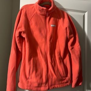 It’s a pink-peach. Picture makes it look red